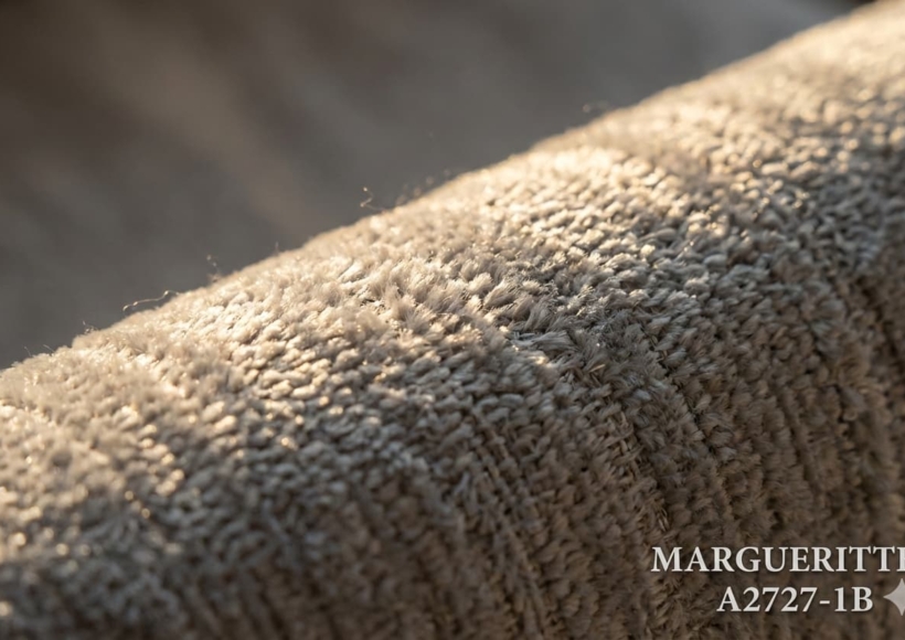 A macro, high-resolution shot of a Chenille fabric texture