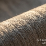 A macro, high-resolution shot of a Chenille fabric texture